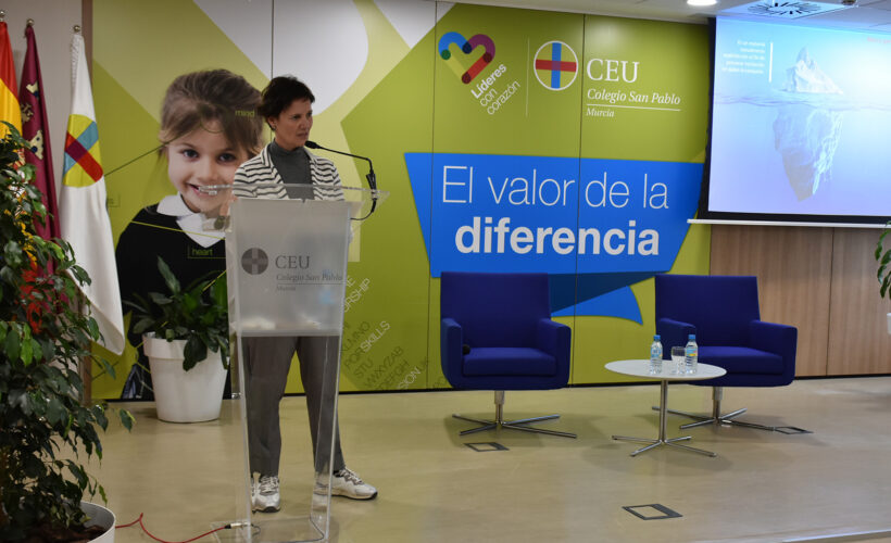 a woman standing at a podium